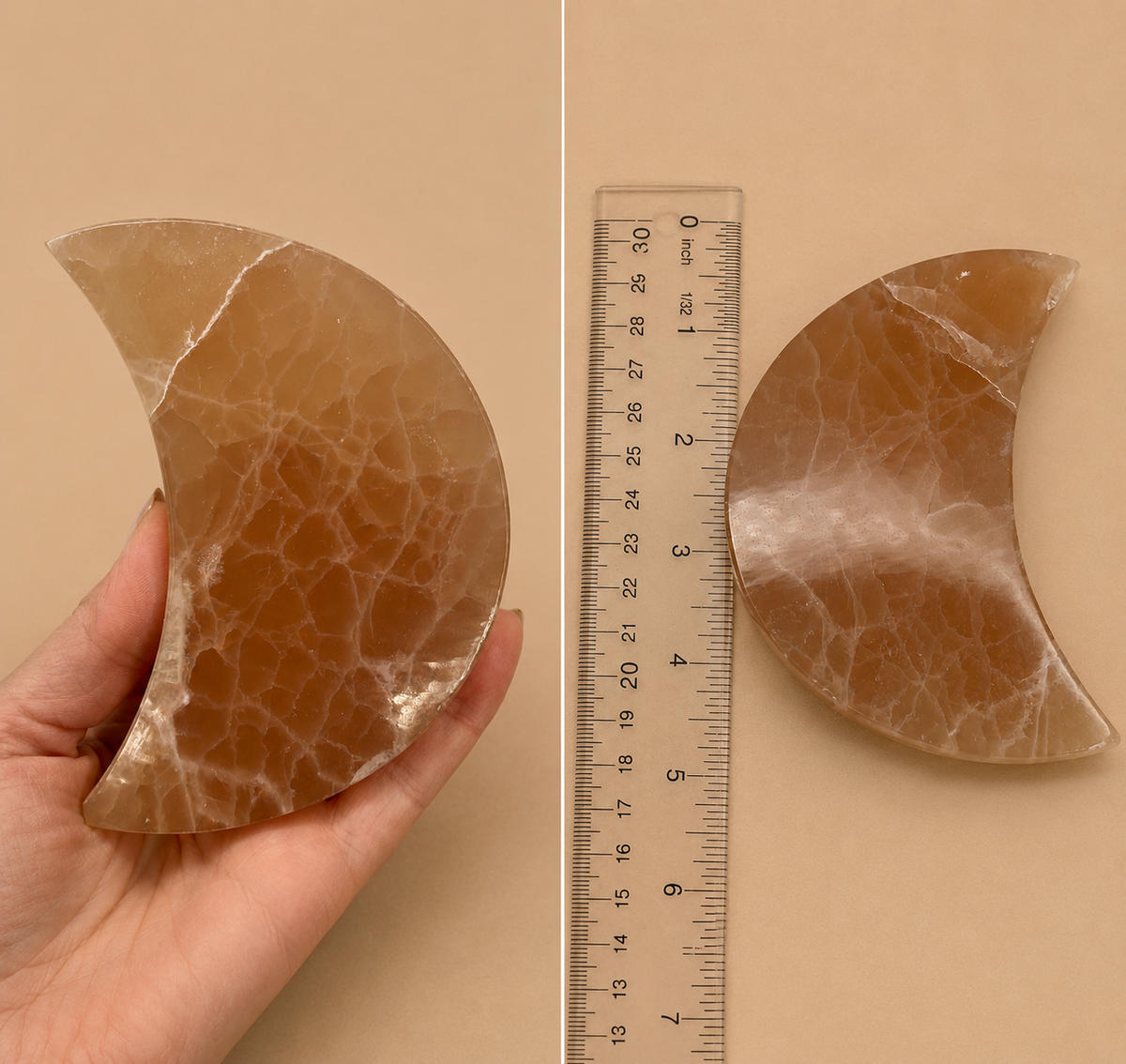 A crescent-shaped polished stone object shown in a split view: held in a hand on the left and placed on a beige surface with a ruler on the right for scale. The stone has a warm tan-brown color with white veining.