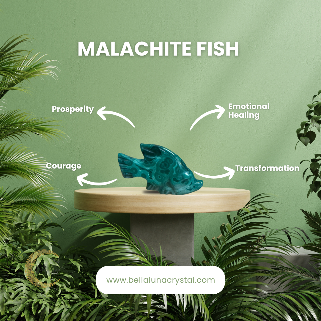 A carved malachite crystal in the shape of a fish displayed on a round platform, with a green body and translucent details, set against a tropical-themed backdrop with plants.
