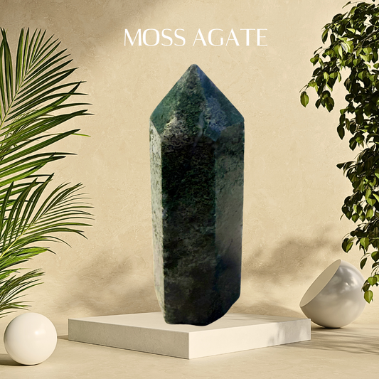 Moss Agate crystal on a white pedestal with plants on a beige background