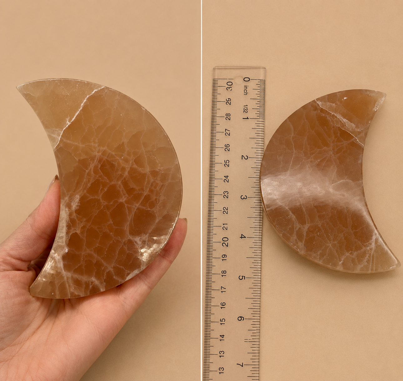 A crescent-shaped polished stone object shown in a split view: held in a hand on the left and placed on a beige surface with a ruler on the right for scale. The stone has a warm tan-brown color with white veining.